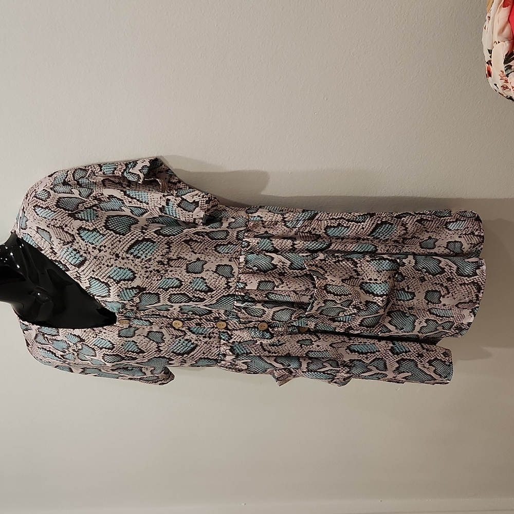 Swt V neck dress of soft crepe material with pink and pale turquoise snake print